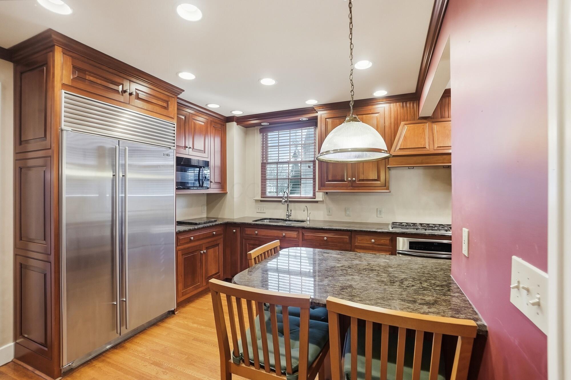 1627 Doone Road Upper Arlington, OH 43221 - Photo 19 of 37 Stainless steel appliances and a built in eating bar.
