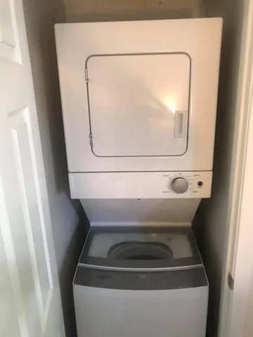 a view of a park with large trees