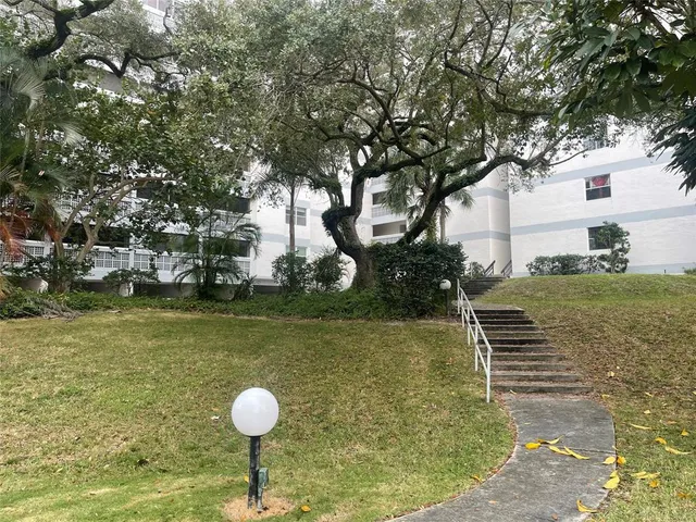 a swimming pool with wooden fence
