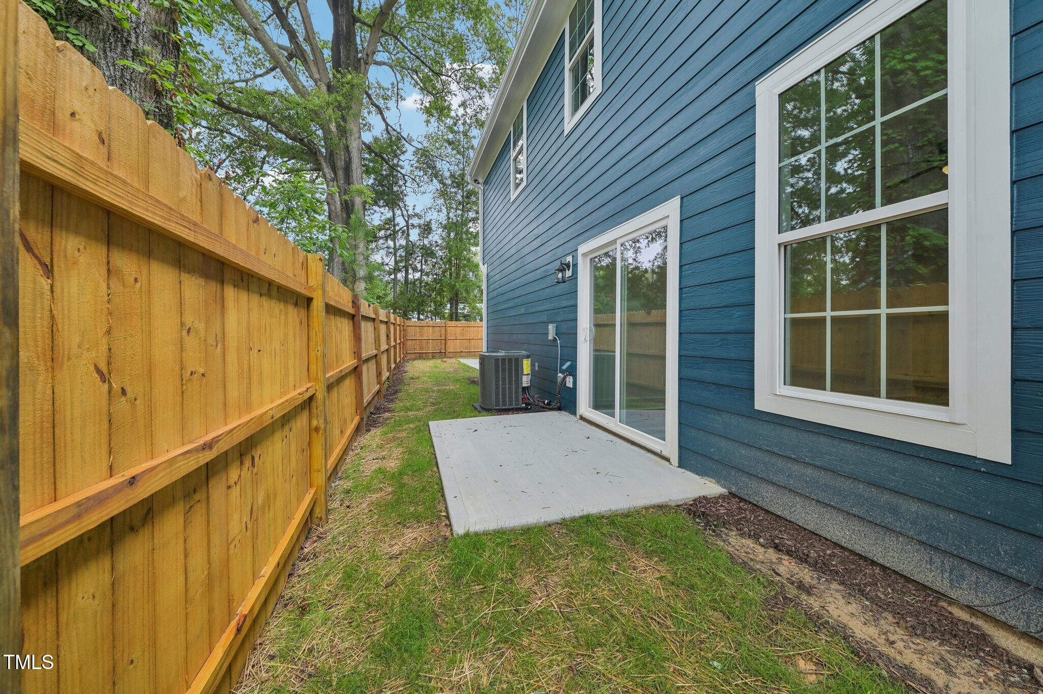 2607 Duke Homestead Road, Unit A Durham, NC 27705 - Photo 20 of 27 a view of balcony with door and wooden floor