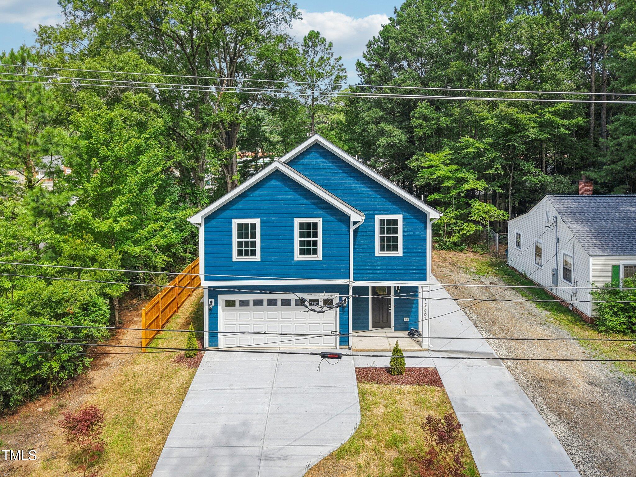 2607 Duke Homestead Road, Unit A Durham, NC 27705 - Photo 24 of 27 a view of house with a swimming pool