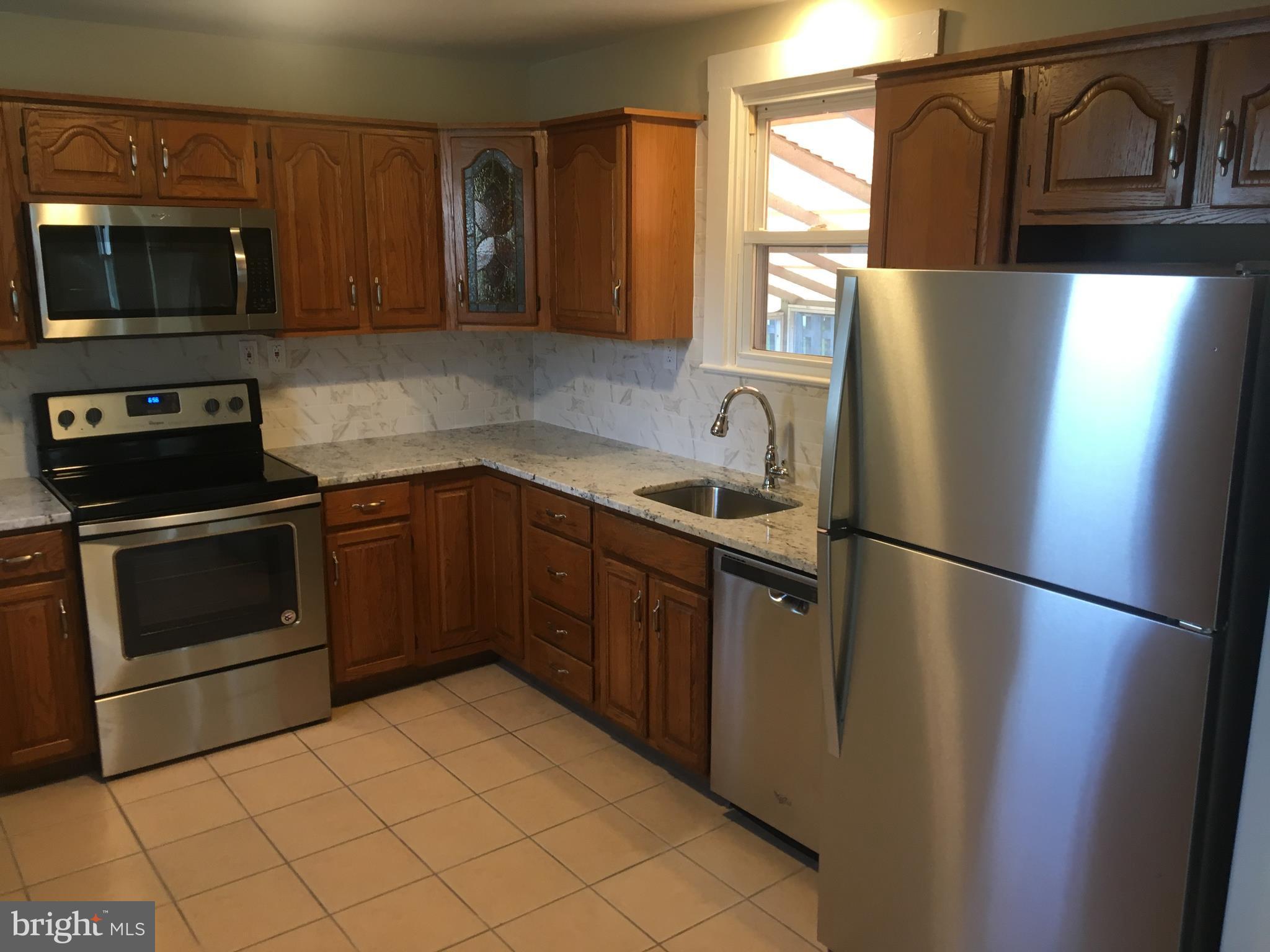 8460 Rugby Road Pasadena, MD 21122 - Photo 7 of 29 Kitchen
