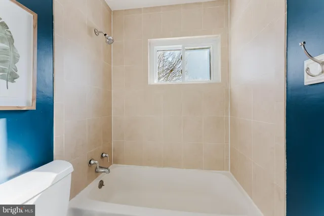 a bathroom with a bathtub