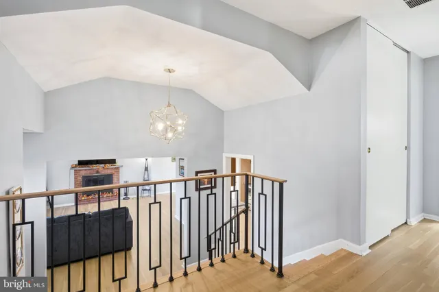 a view of a hallway with windows