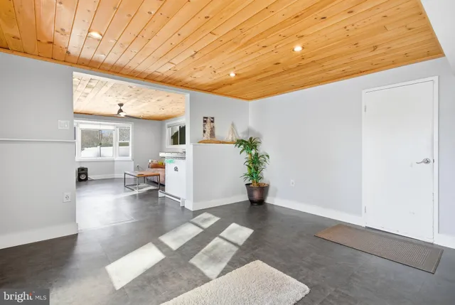 a view of livingroom with furniture and floor to ceiling window