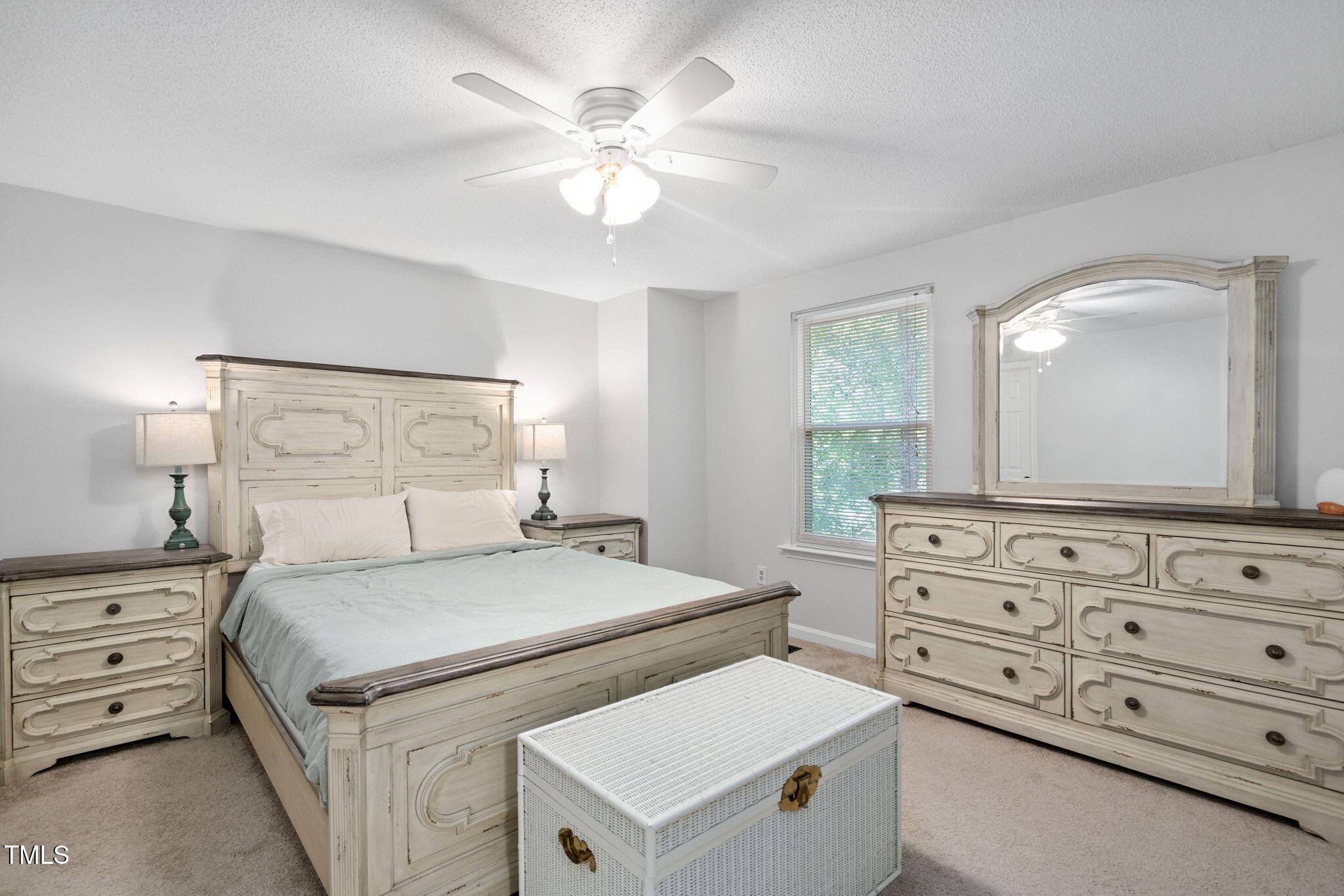 7286 Shellburne Drive Raleigh, NC 27612 - Photo 10 of 36 a bedroom with a bed and a dresser