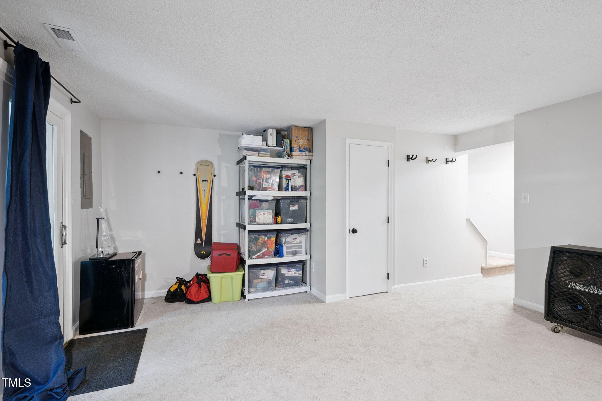 7286 Shellburne Drive Raleigh, NC 27612 - Photo 20 of 36 a view of walk in closet with clothes and shoes