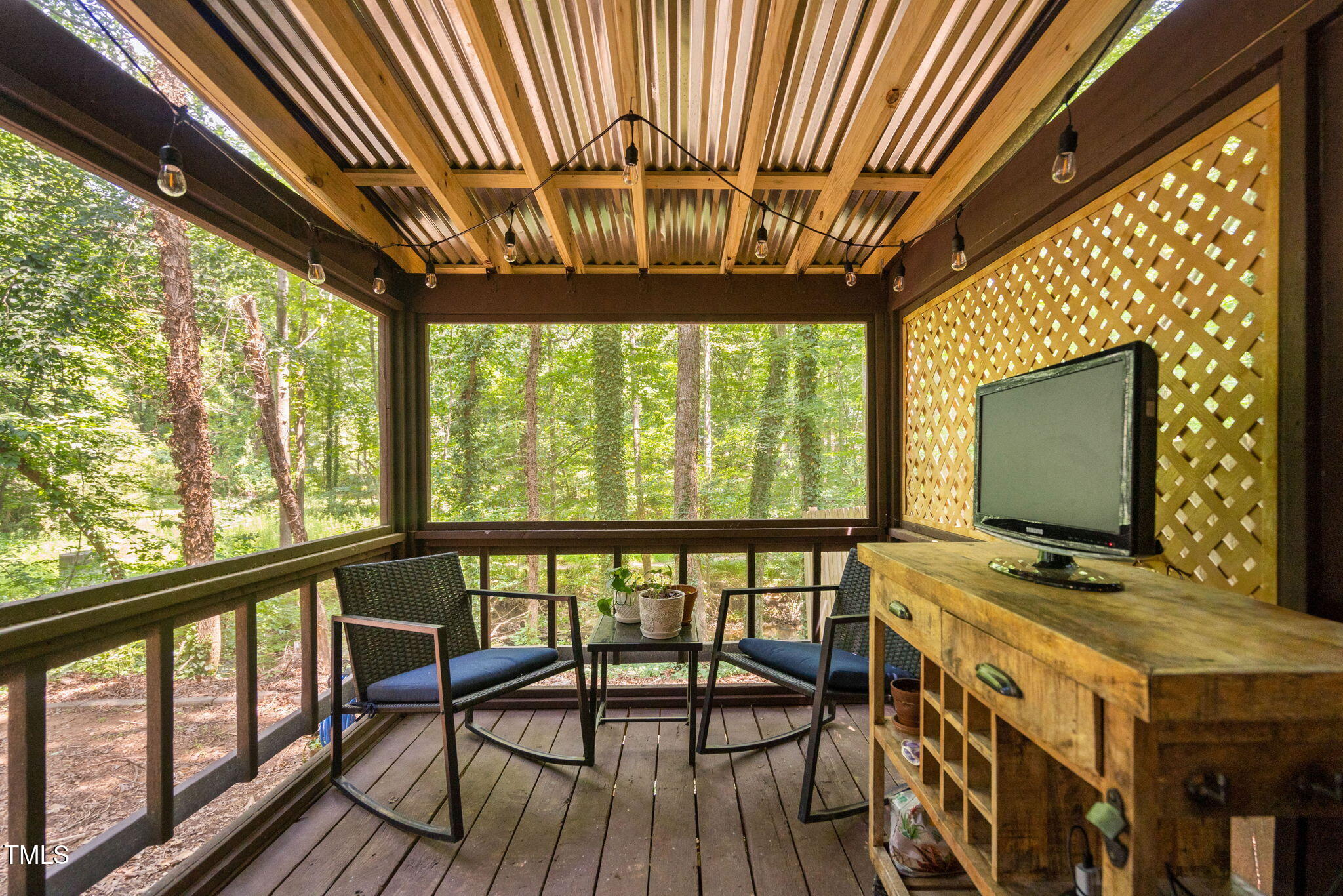 7286 Shellburne Drive Raleigh, NC 27612 - Photo 25 of 36 a view of porch with seating space