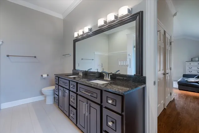 a bathroom with a tub shower and sink