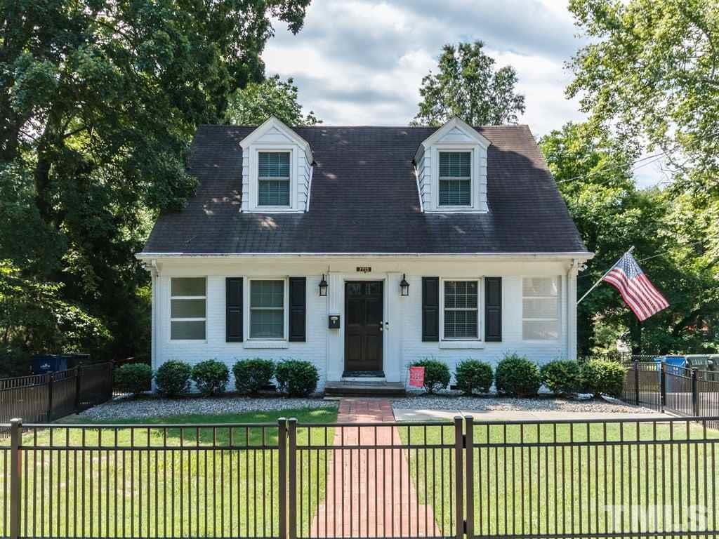 2715 Kilgore Avenue Raleigh, NC 27607 - Photo 1 of 25 a front view of a house with a yard