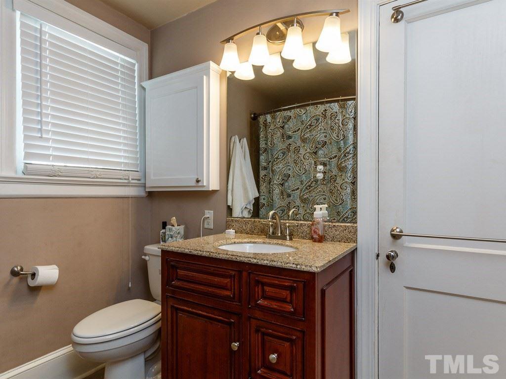 2715 Kilgore Avenue Raleigh, NC 27607 - Photo 13 of 25 a bathroom with a sink and a toilet