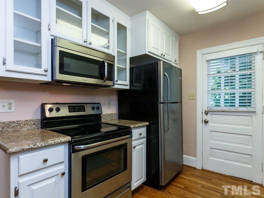 2715 Kilgore Avenue Raleigh, NC 27607 - Photo 20 of 25 a kitchen with granite countertop cabinets and steel stainless steel appliances