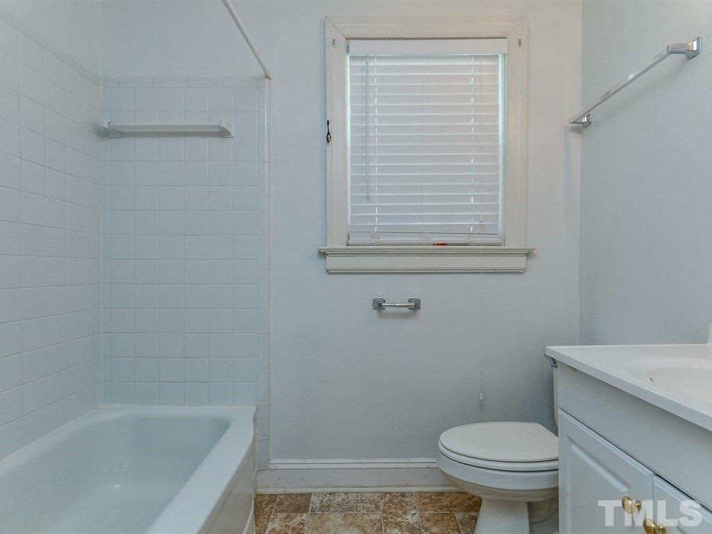 2715 Kilgore Avenue Raleigh, NC 27607 - Photo 6 of 25 a bathroom with a sink and a toilet