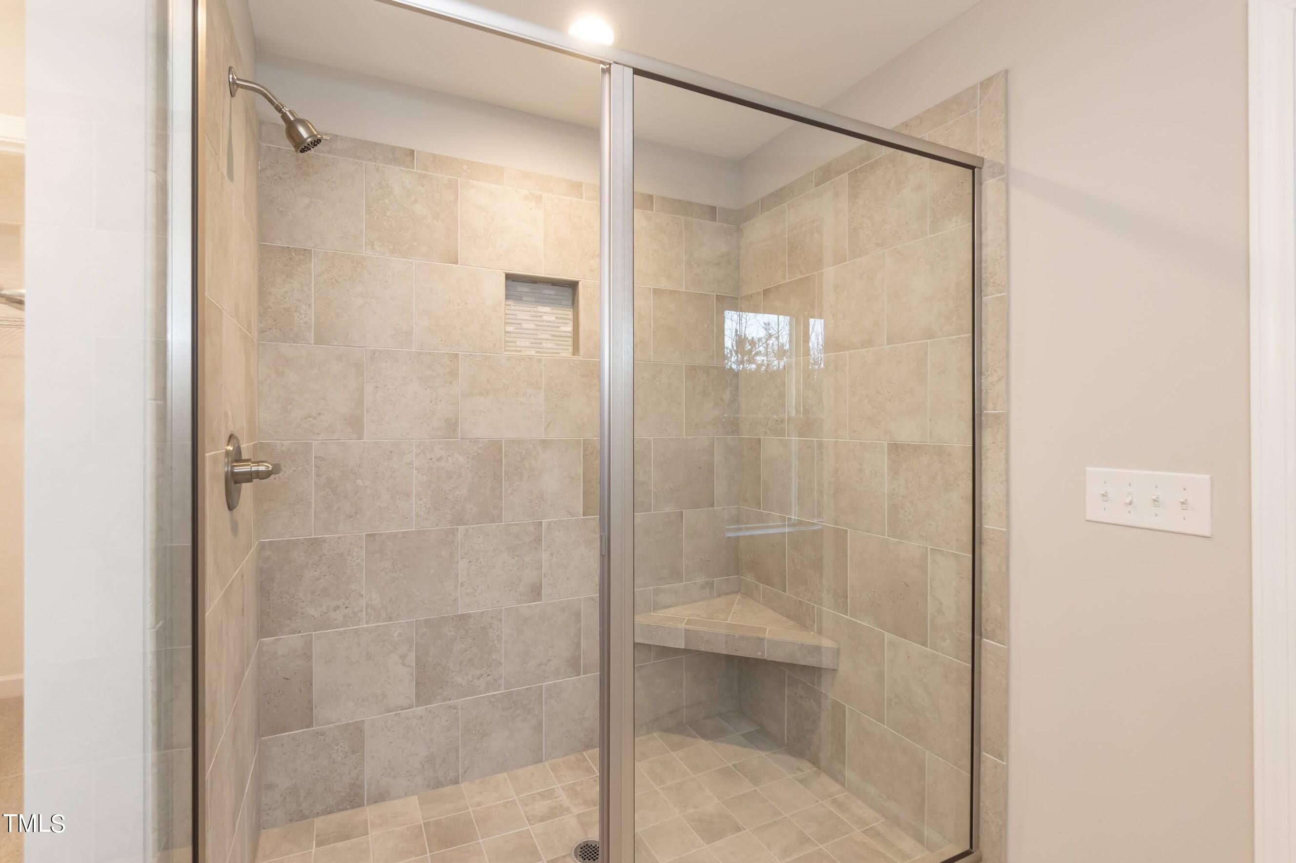 500 Poplar Springs Church Road Raleigh, NC 27603 - Photo 29 of 36 a bathroom with a glass shower door