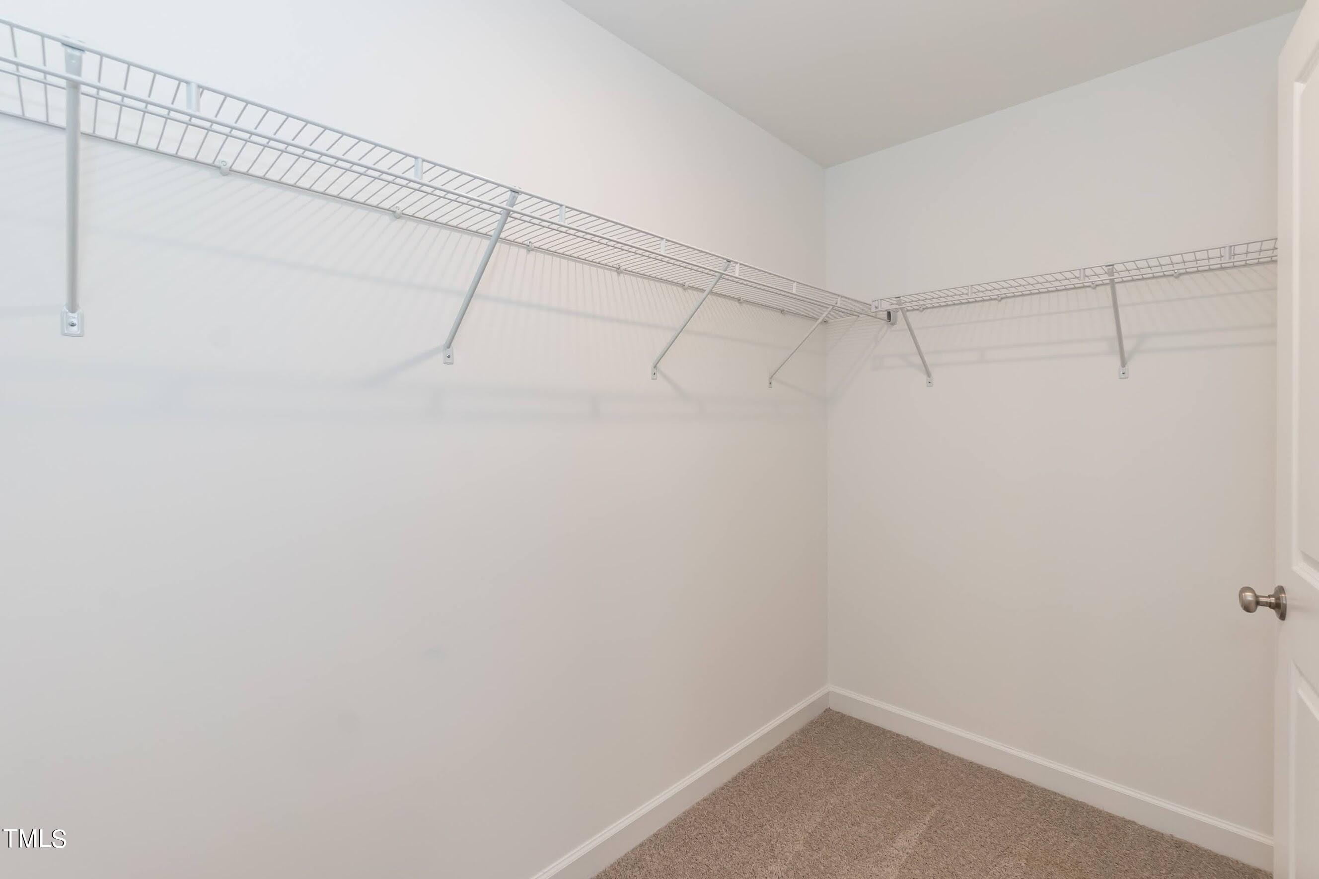 500 Poplar Springs Church Road Raleigh, NC 27603 - Photo 30 of 36 a view of a room with racks on the wall