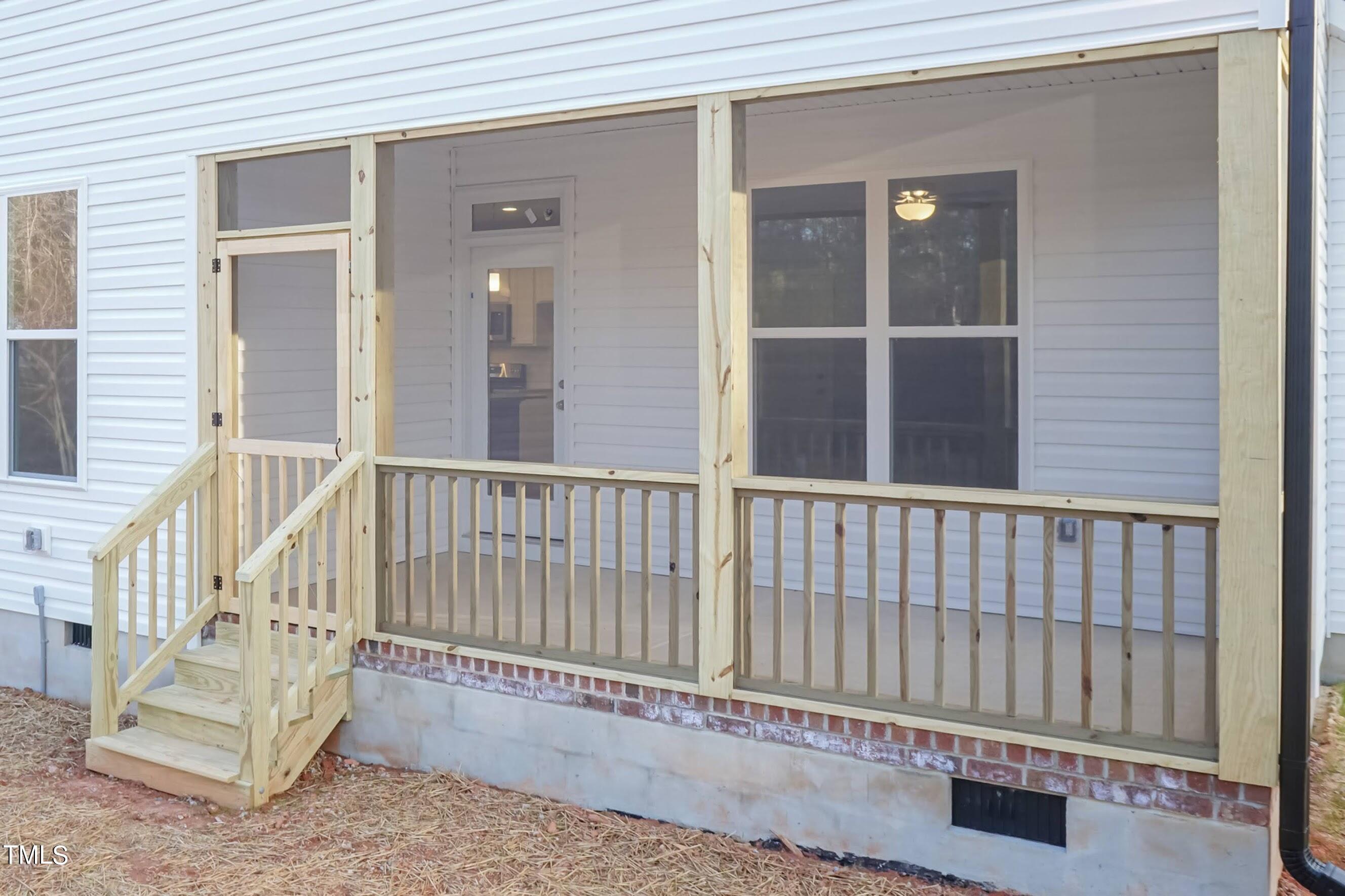 500 Poplar Springs Church Road Raleigh, NC 27603 - Photo 8 of 36 a view of porch with wooden deck