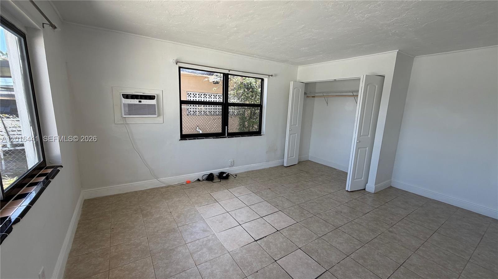2230 Service Road Opa-Locka, FL 33054 - Photo 7 of 25 an empty room with windows