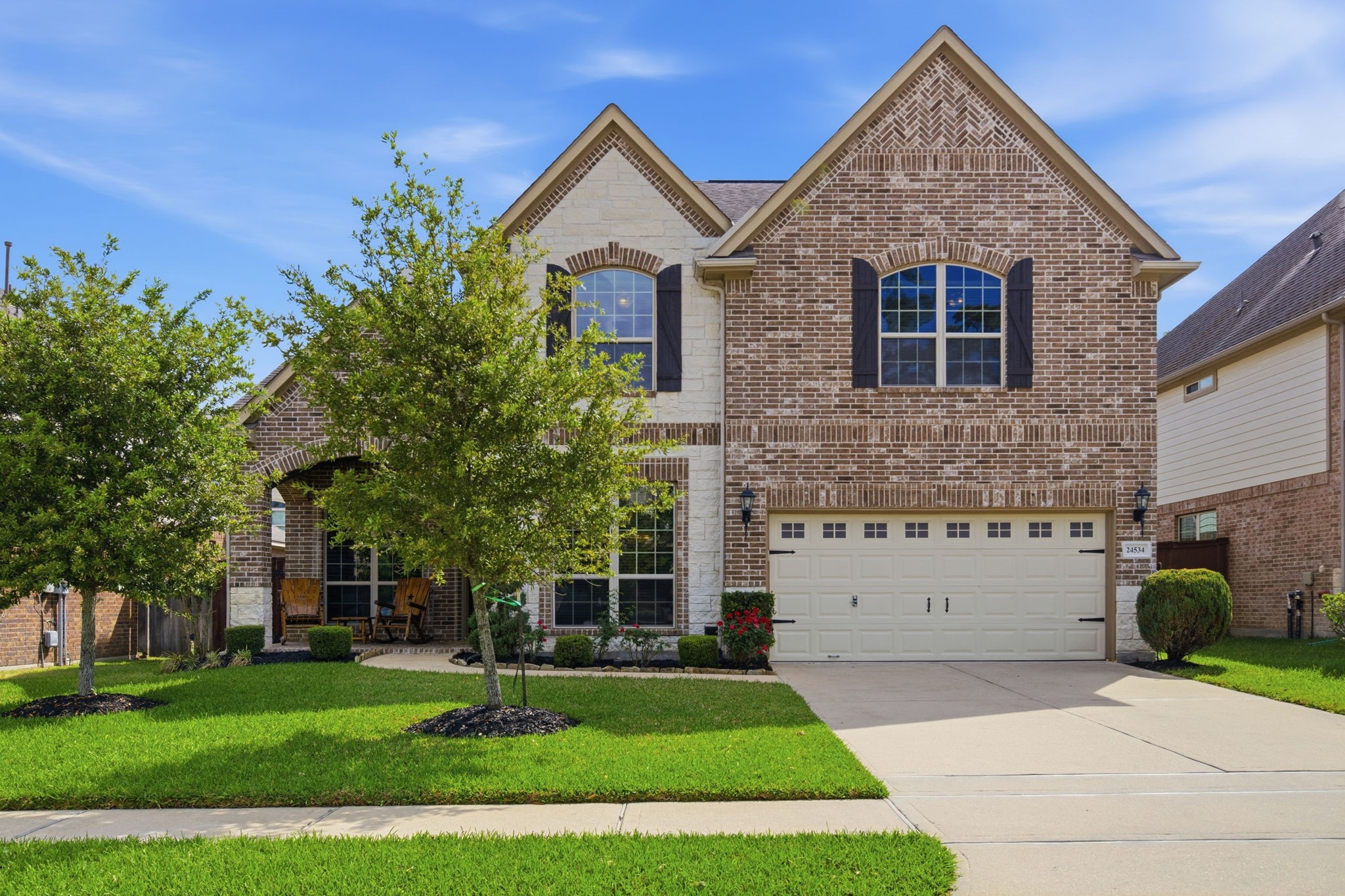 24534 Jenns Creek Court Spring, TX 77389 - Photo 1 of 31 a front view of a house with a yard