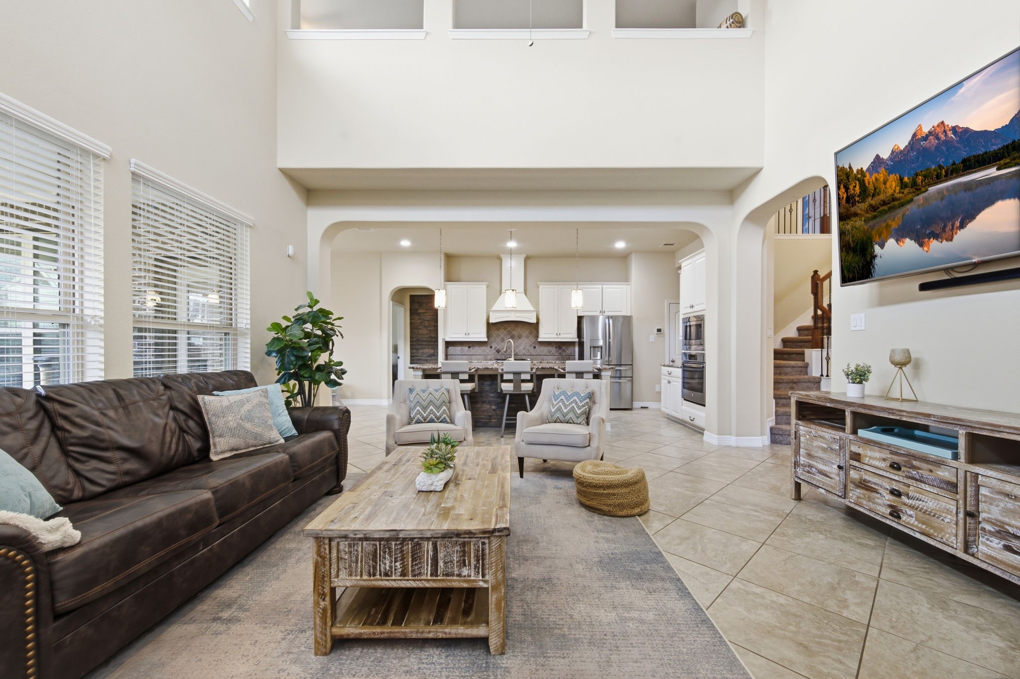 24534 Jenns Creek Court Spring, TX 77389 - Photo 11 of 31 a living room with furniture and a flat screen tv