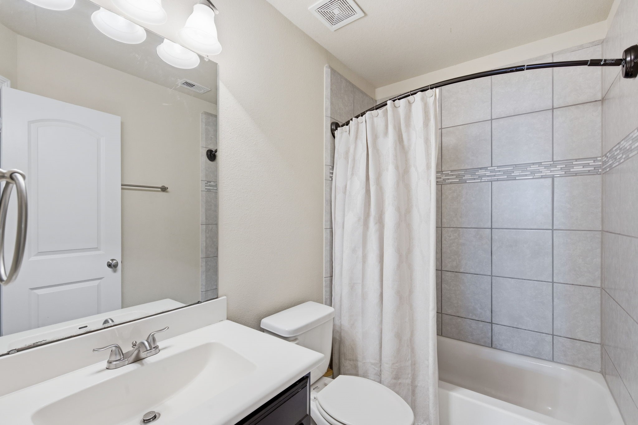 24534 Jenns Creek Court Spring, TX 77389 - Photo 23 of 31 a bathroom with a sink toilet and shower