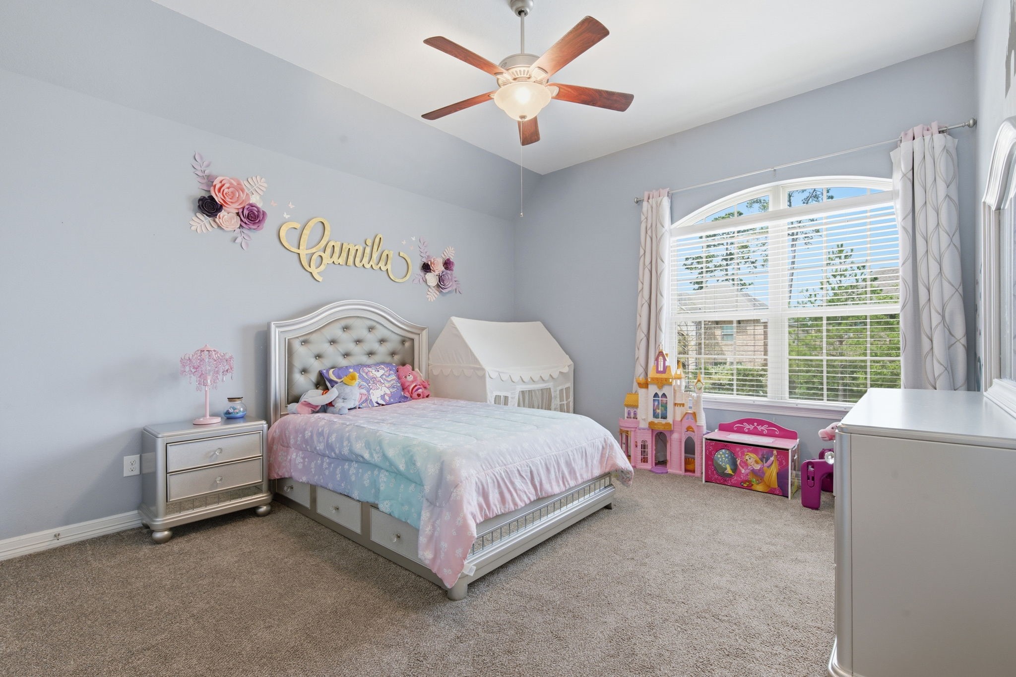 24534 Jenns Creek Court Spring, TX 77389 - Photo 24 of 31 a bedroom with a bed and a window