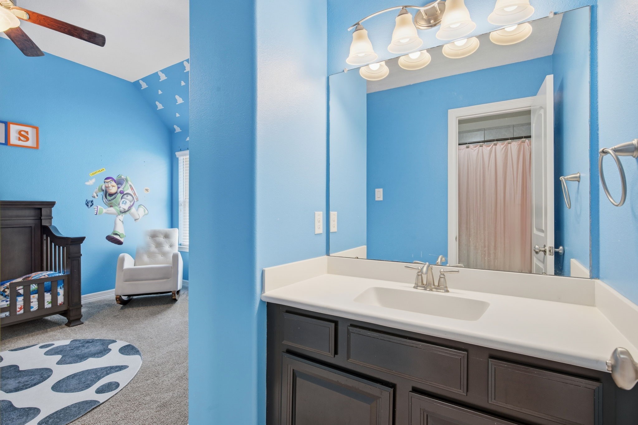 24534 Jenns Creek Court Spring, TX 77389 - Photo 27 of 31 a en suite bathroom with a sink double vanity and a mirror