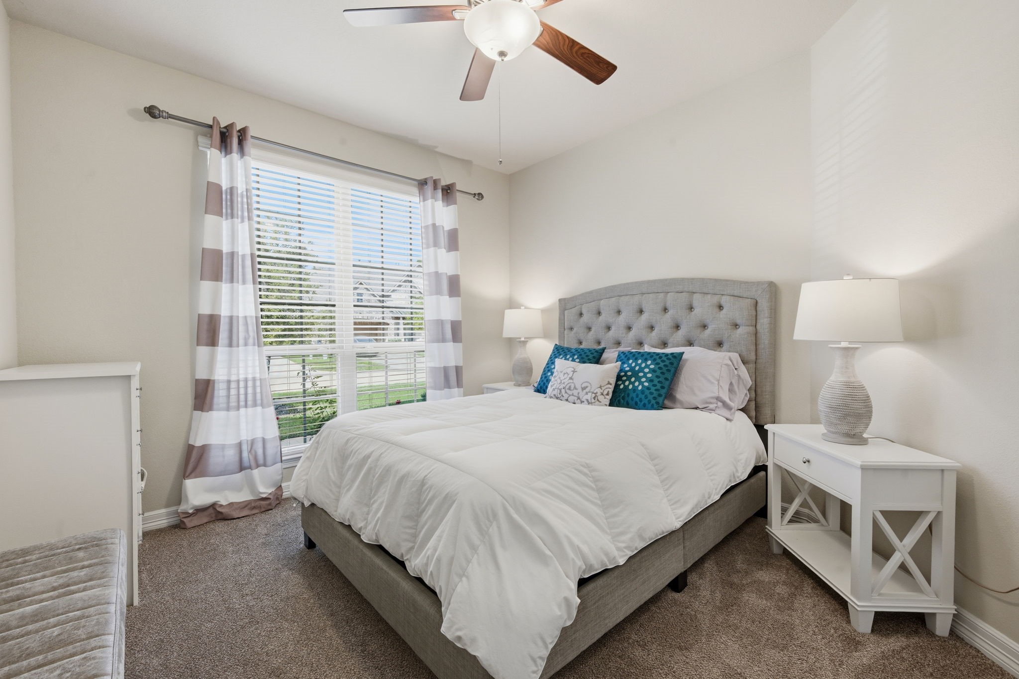 24534 Jenns Creek Court Spring, TX 77389 - Photo 6 of 31 a bedroom with a bed and a window