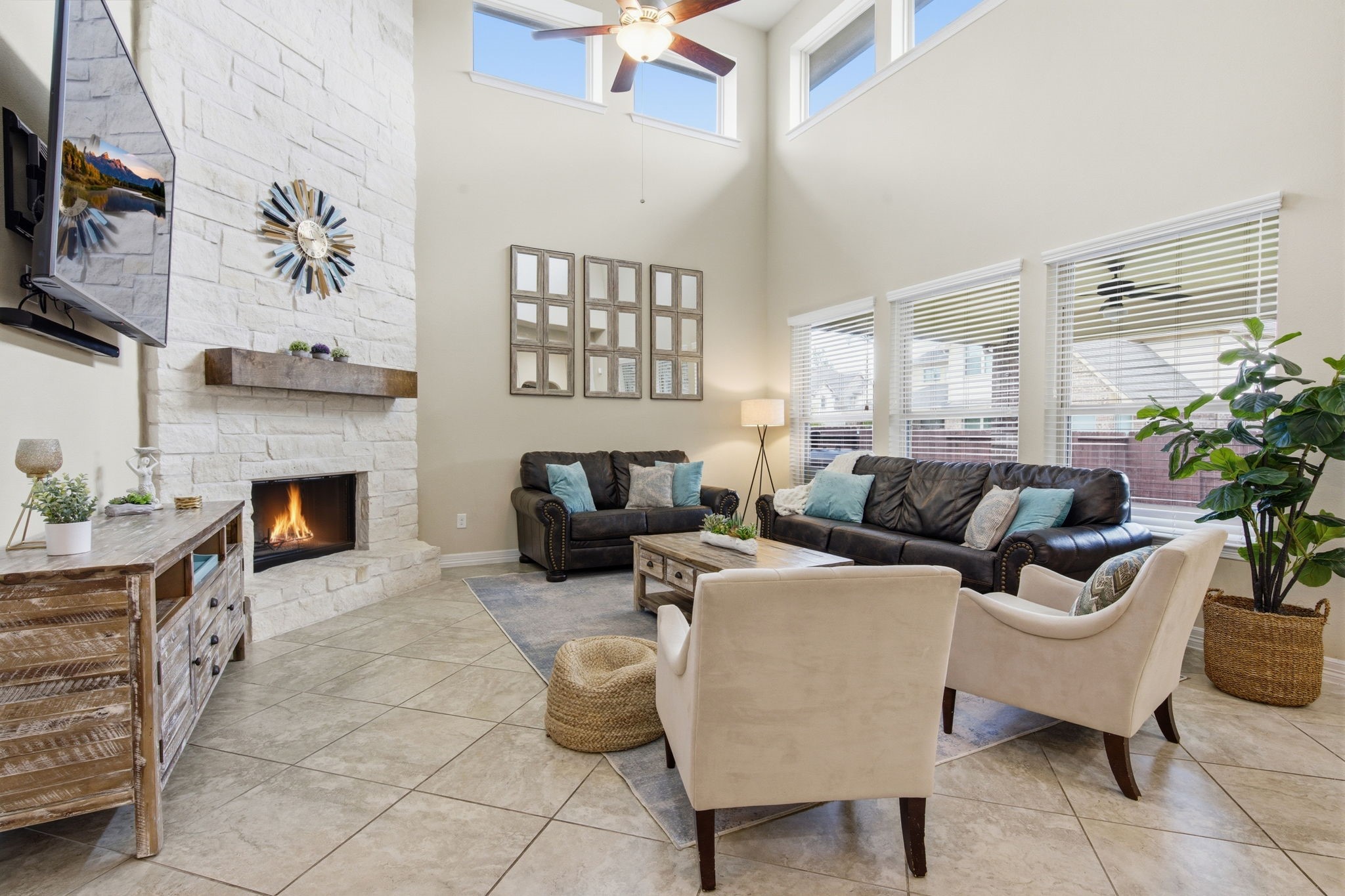 24534 Jenns Creek Court Spring, TX 77389 - Photo 8 of 31 a living room with furniture a fireplace and a flat screen tv