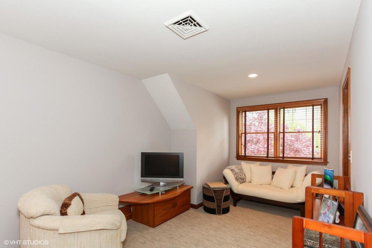 74 Oval Road Chatham, MA 02633 - Photo 12 of 16 a living room with furniture and a flat screen tv