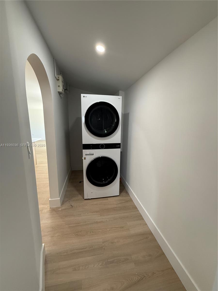 4850 Southwest 93rd Court Miami, FL 33165 - Photo 11 of 25 a view of a hallway with washer and dryer