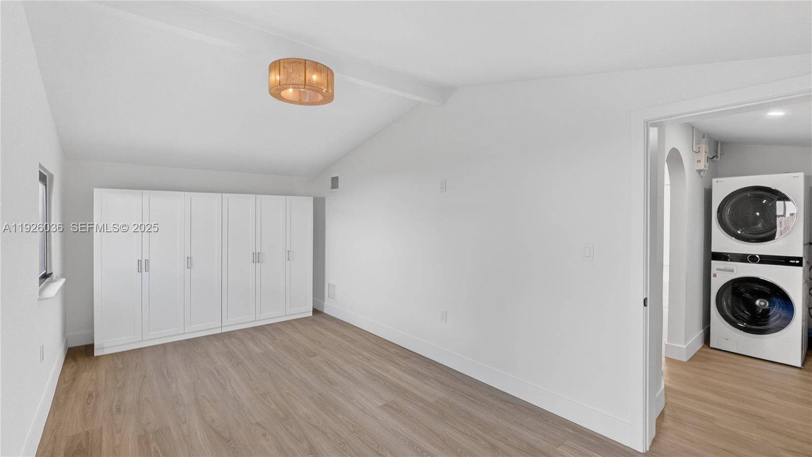 4850 Southwest 93rd Court Miami, FL 33165 - Photo 12 of 25 a view of a storage & utility room with wooden floor