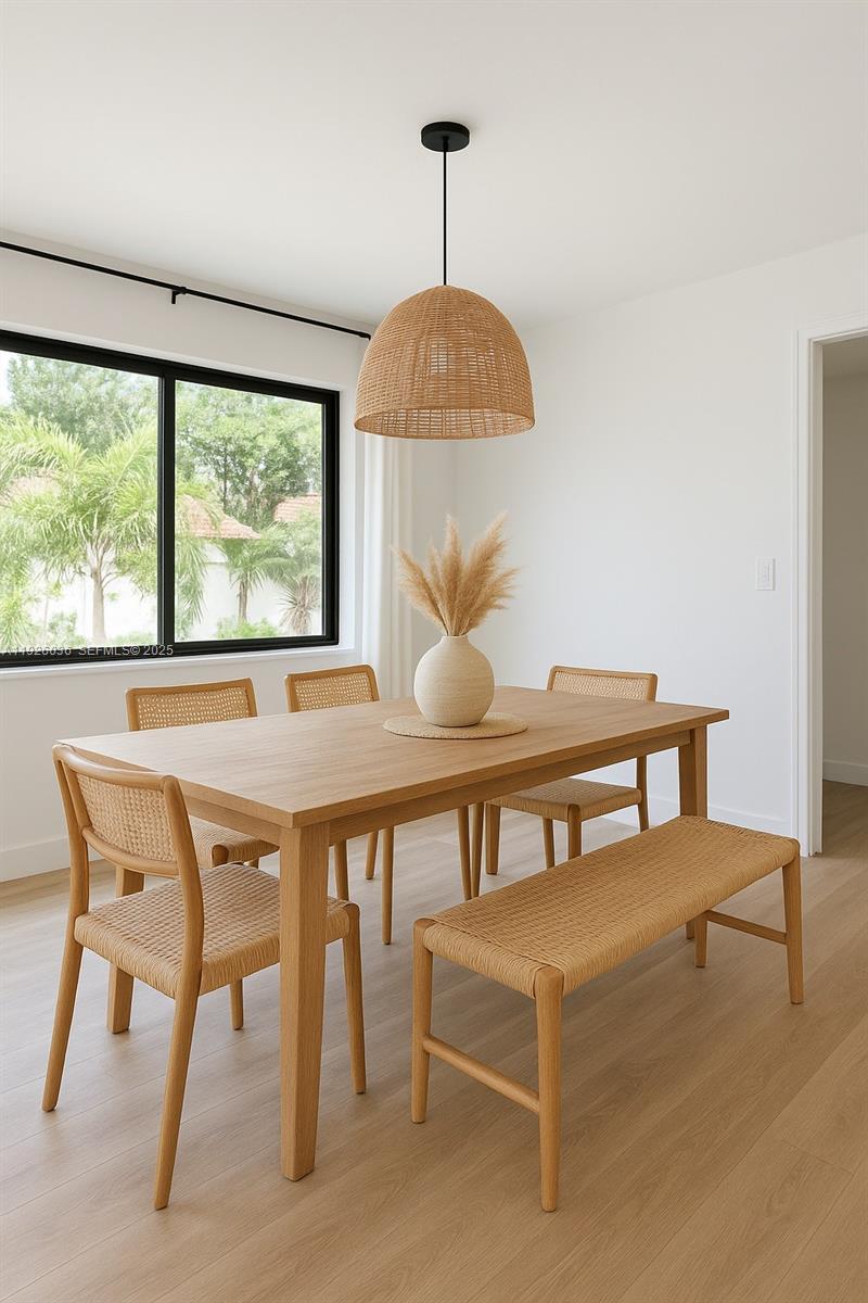 4850 Southwest 93rd Court Miami, FL 33165 - Photo 2 of 25 a dining room with furniture and window