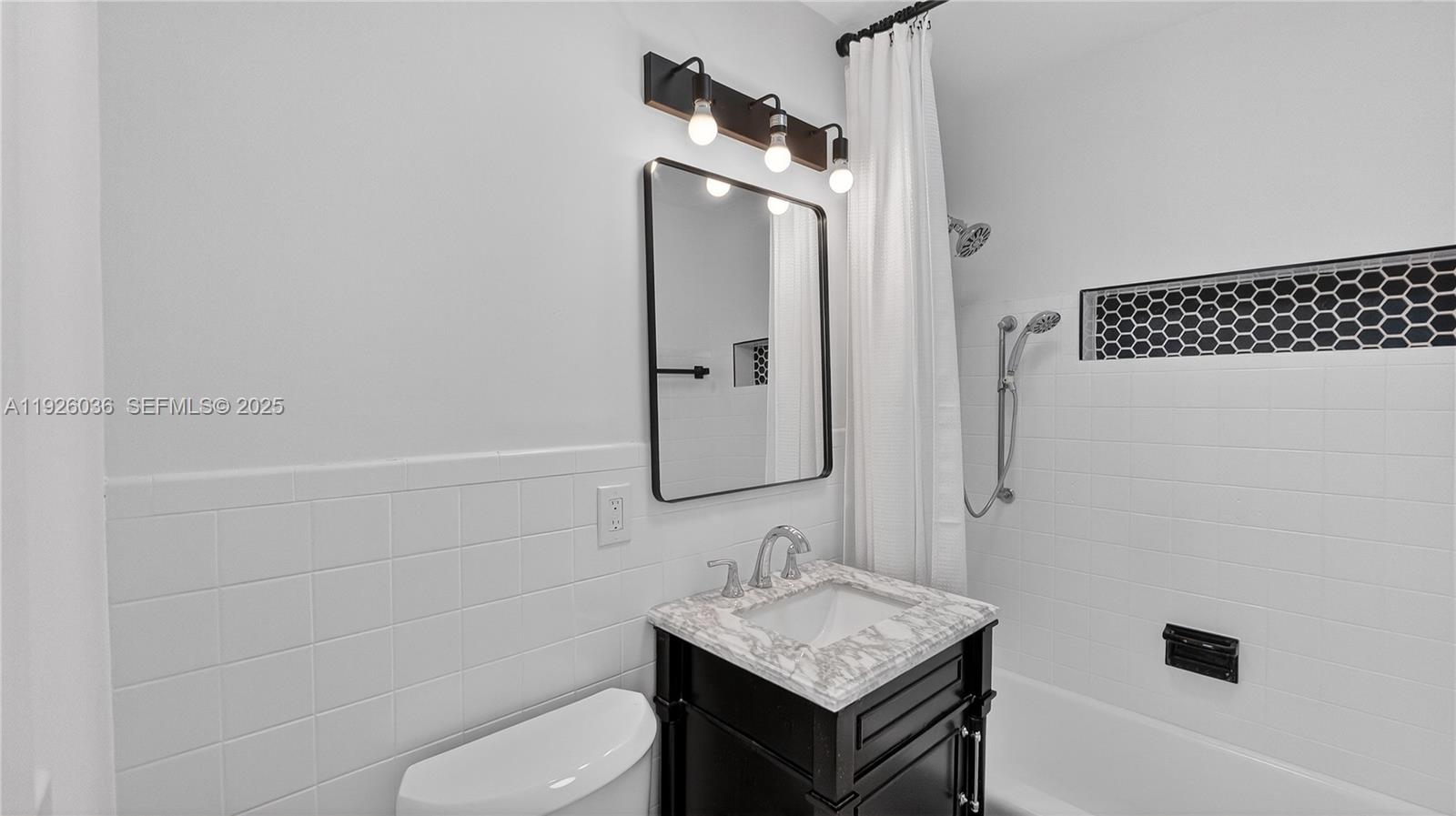 4850 Southwest 93rd Court Miami, FL 33165 - Photo 22 of 25 a bathroom with a sink toilet and shower