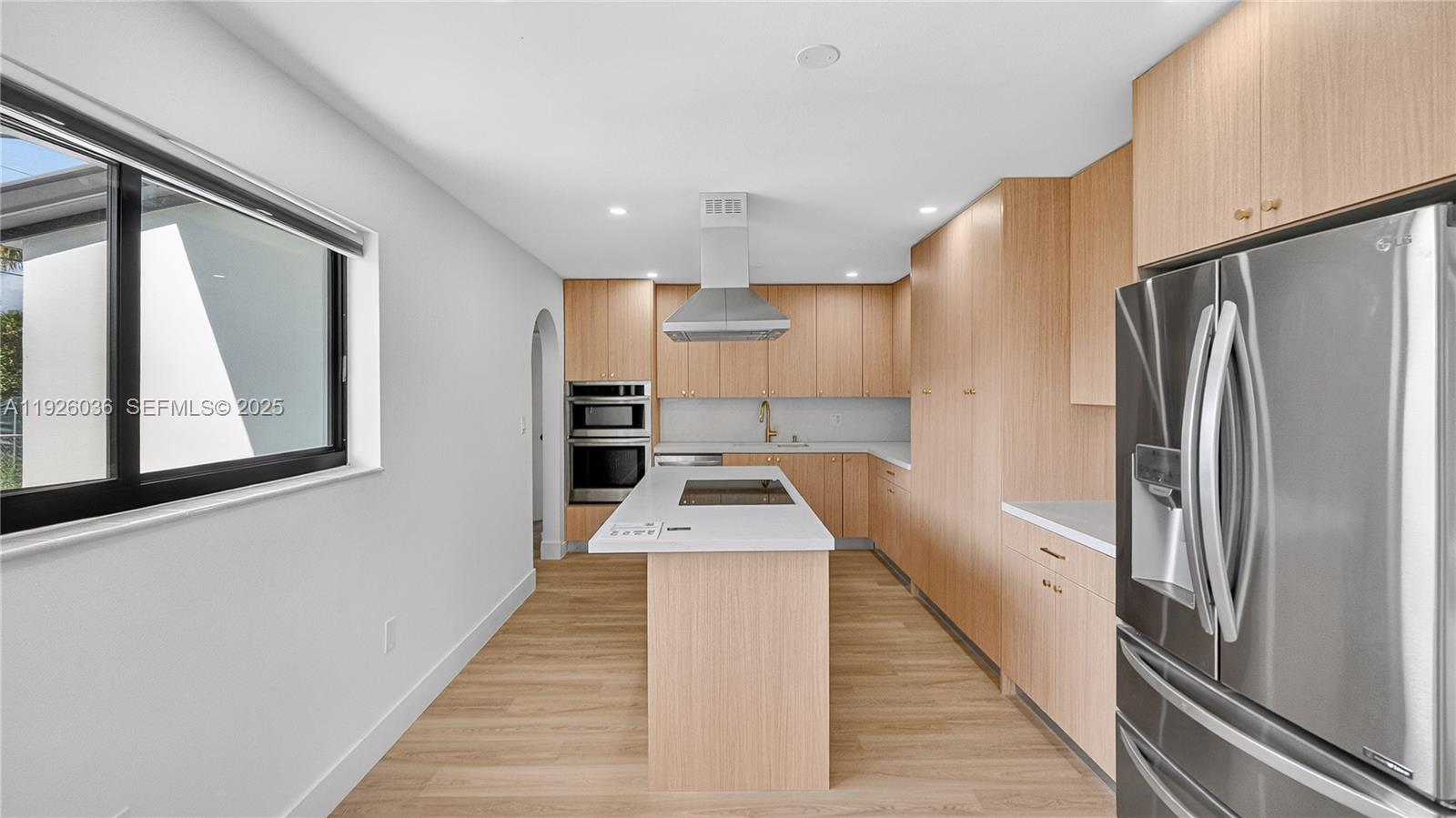 4850 Southwest 93rd Court Miami, FL 33165 - Photo 7 of 25 a kitchen with stainless steel appliances granite countertop a refrigerator and a stove