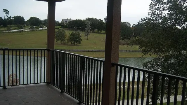 a balcony with lake view