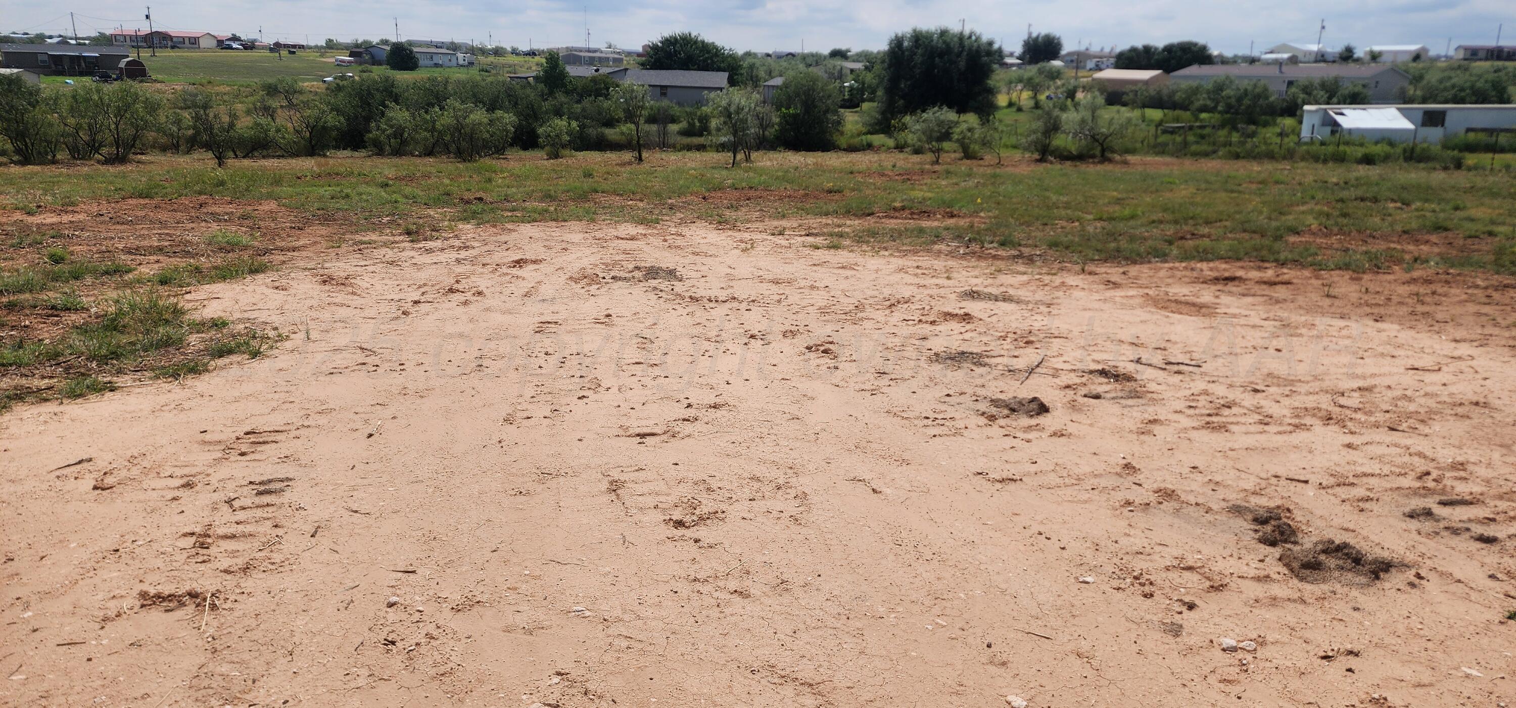 5207 Tomahawk Trail Amarillo, TX 79124 - Photo 2 of 4 a view of dirt and green space
