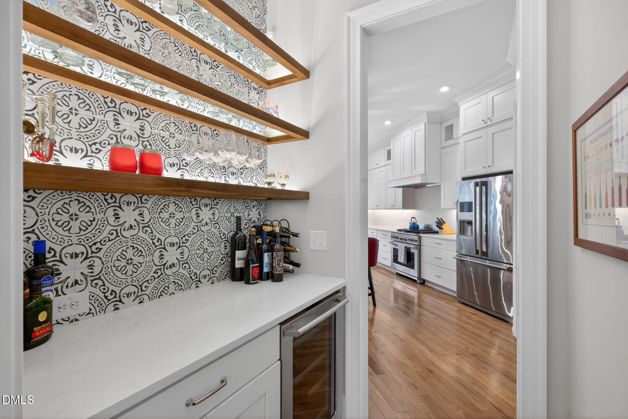 6901 Ray Family Farm Court Raleigh, NC 27613 - Photo 6 of 52 a kitchen with stainless steel appliances granite countertop a refrigerator and a sink