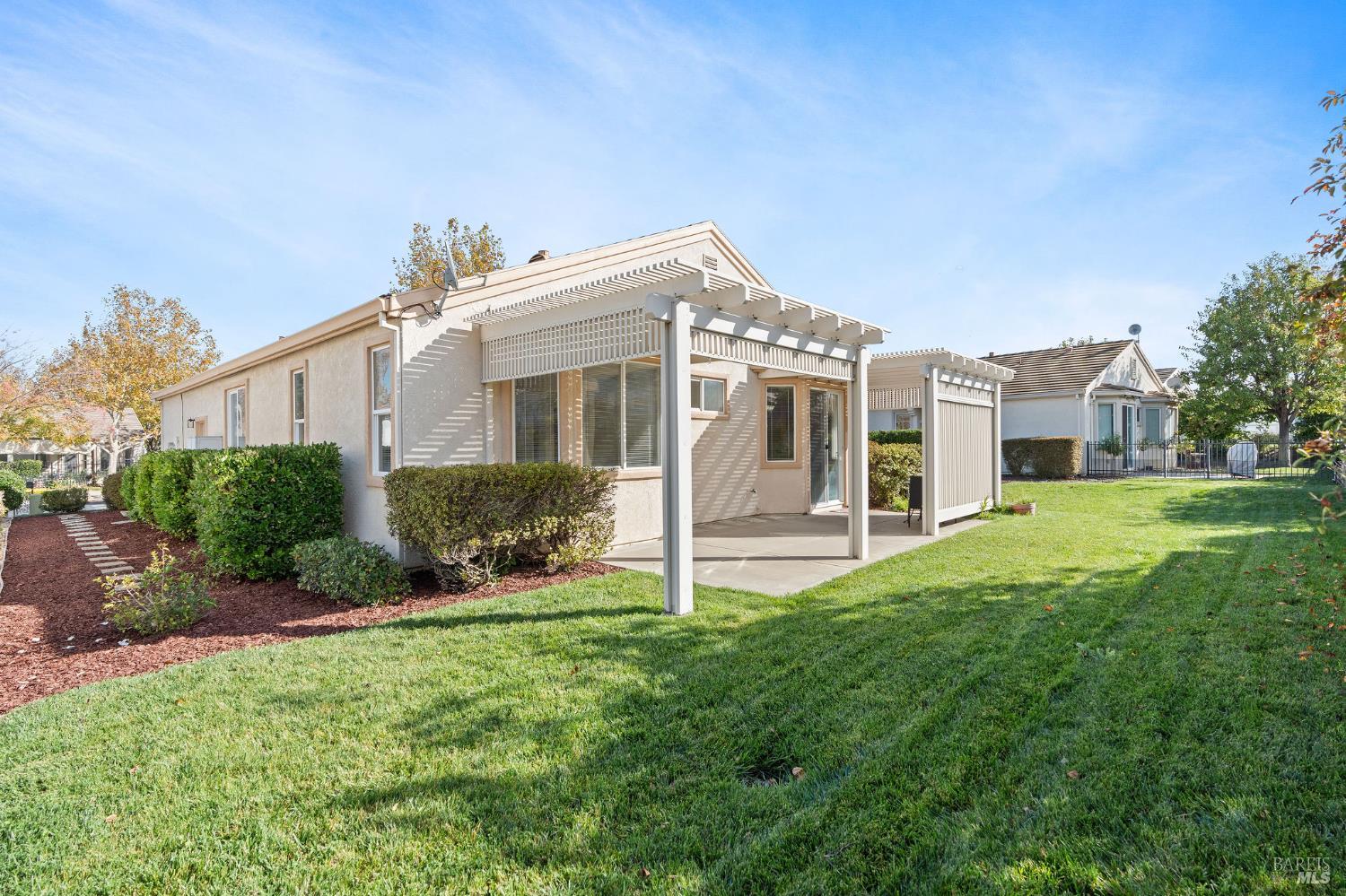 732 Summerset Drive Rio Vista, CA 94571 - Photo 26 of 68 backyard with covered patio and expansive lawnn
