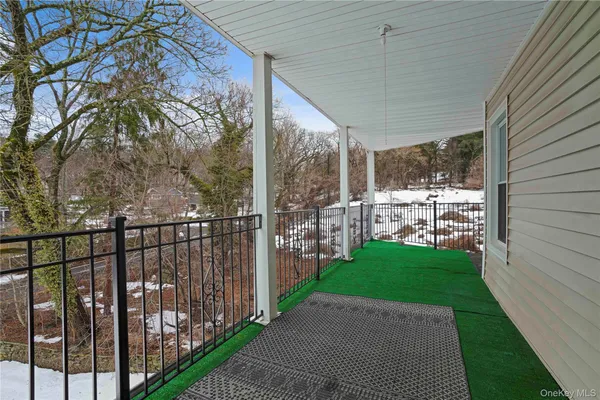 a view of a porch with a yard