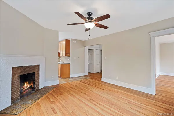a bedroom with a bed and a fireplace