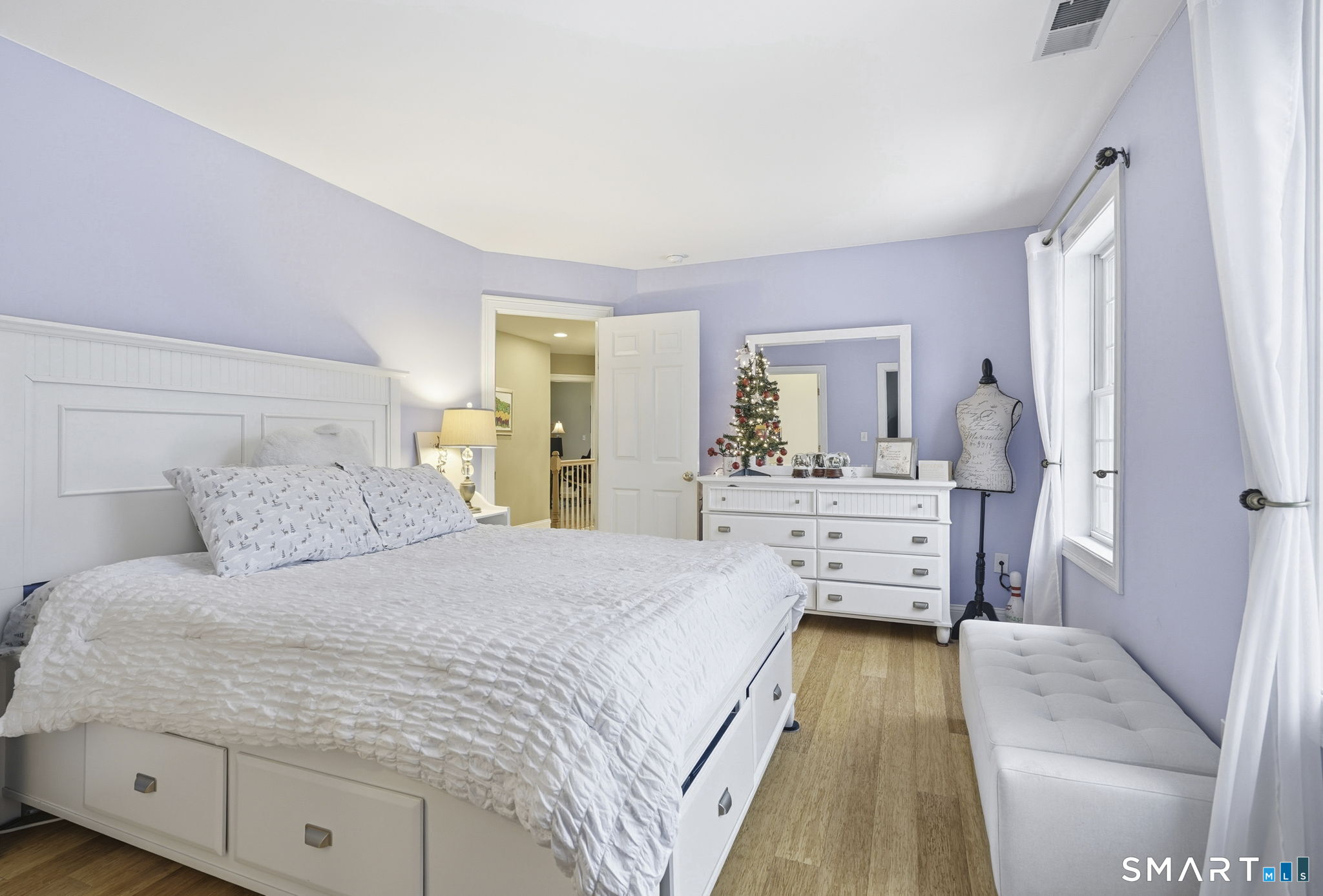 24 Scott Road Oxford, CT 06478 - Photo 17 of 39 a large white bed in a white room