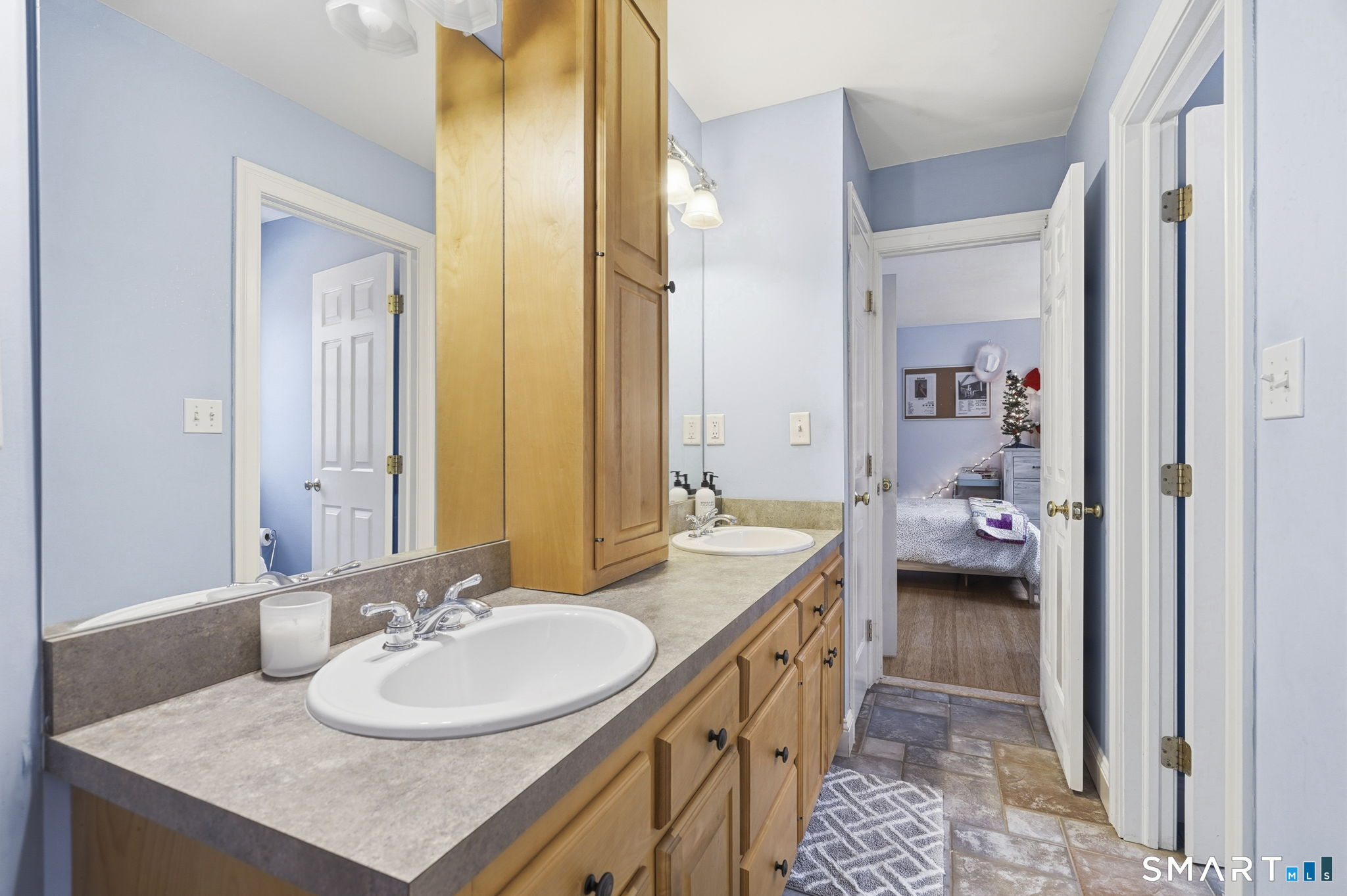 24 Scott Road Oxford, CT 06478 - Photo 21 of 39 a en suite bathroom with a granite countertop sink and a mirror