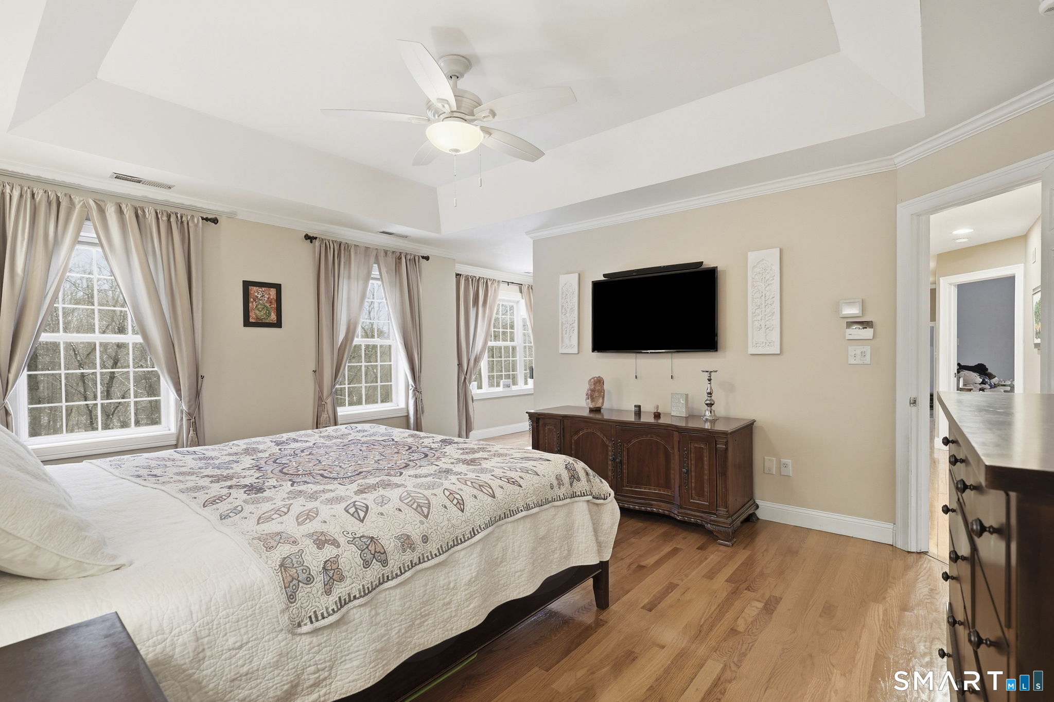 24 Scott Road Oxford, CT 06478 - Photo 23 of 39 a spacious bedroom with a bed and a flat screen tv