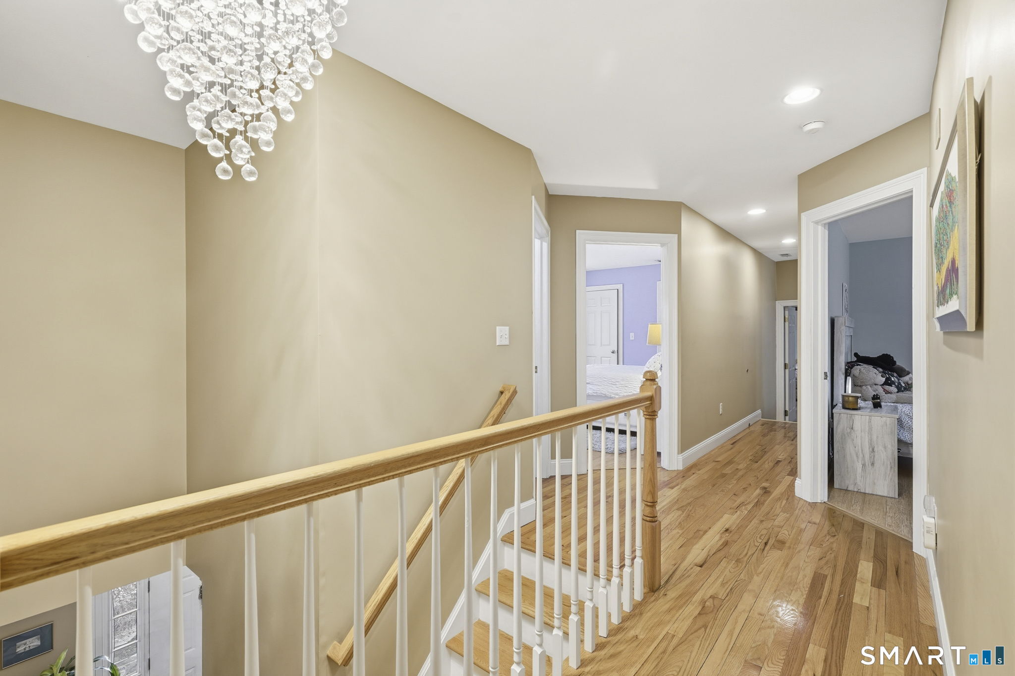 24 Scott Road Oxford, CT 06478 - Photo 24 of 39 a view of a hallway view with wooden floor and staircase