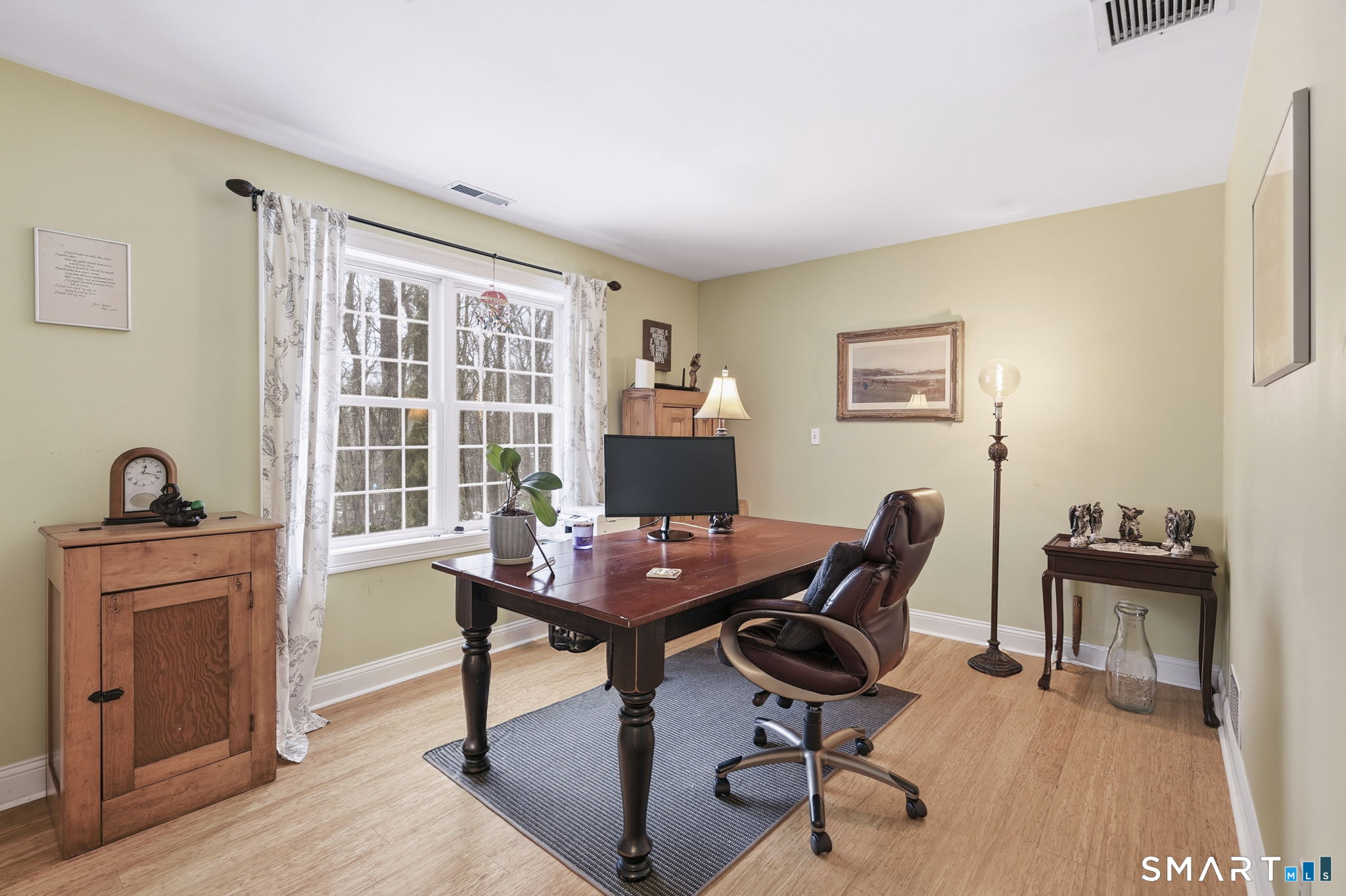 24 Scott Road Oxford, CT 06478 - Photo 25 of 39 a view of a workspace with furniture and a window