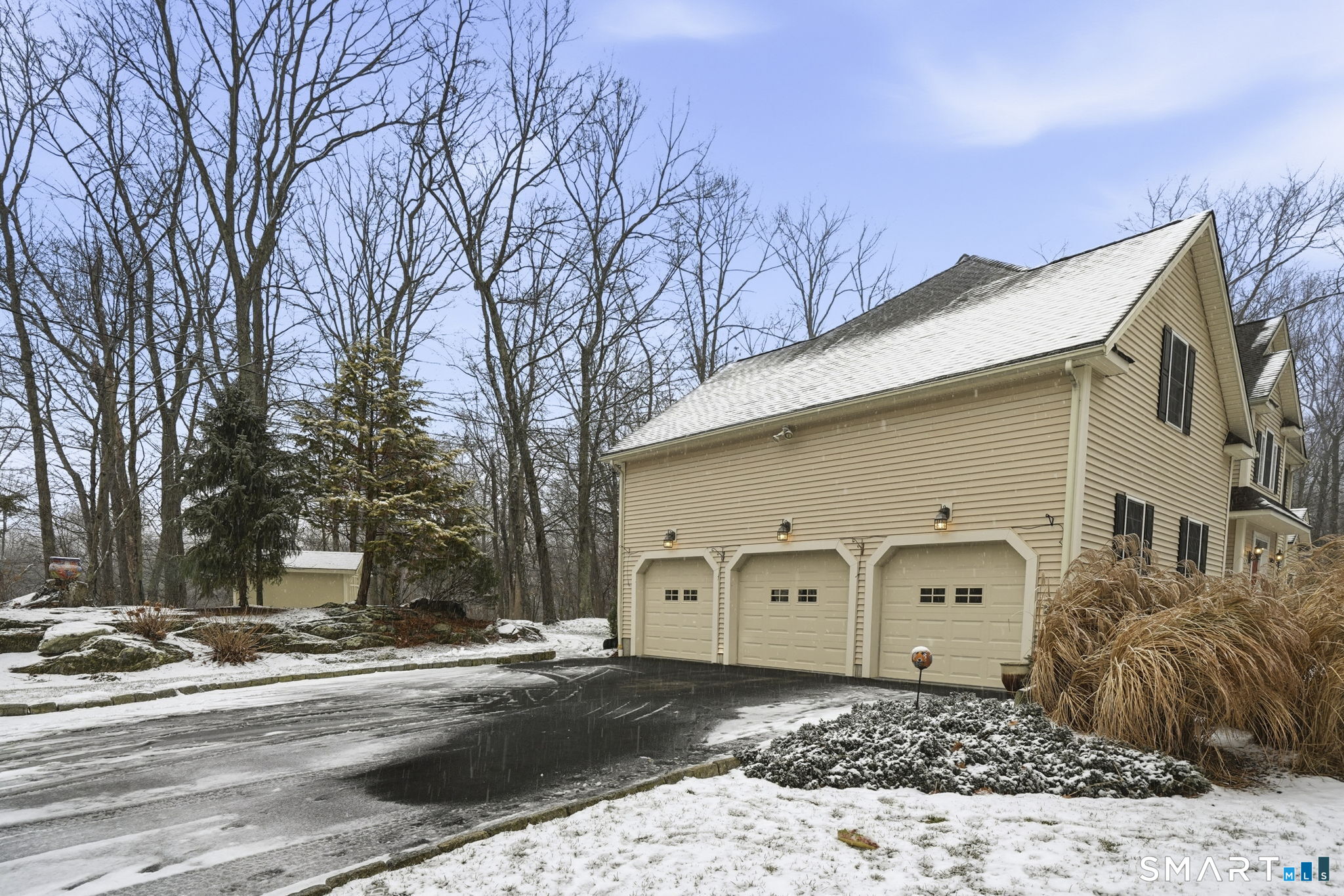 24 Scott Road Oxford, CT 06478 - Photo 30 of 39 a front view of a house with a yard and garage