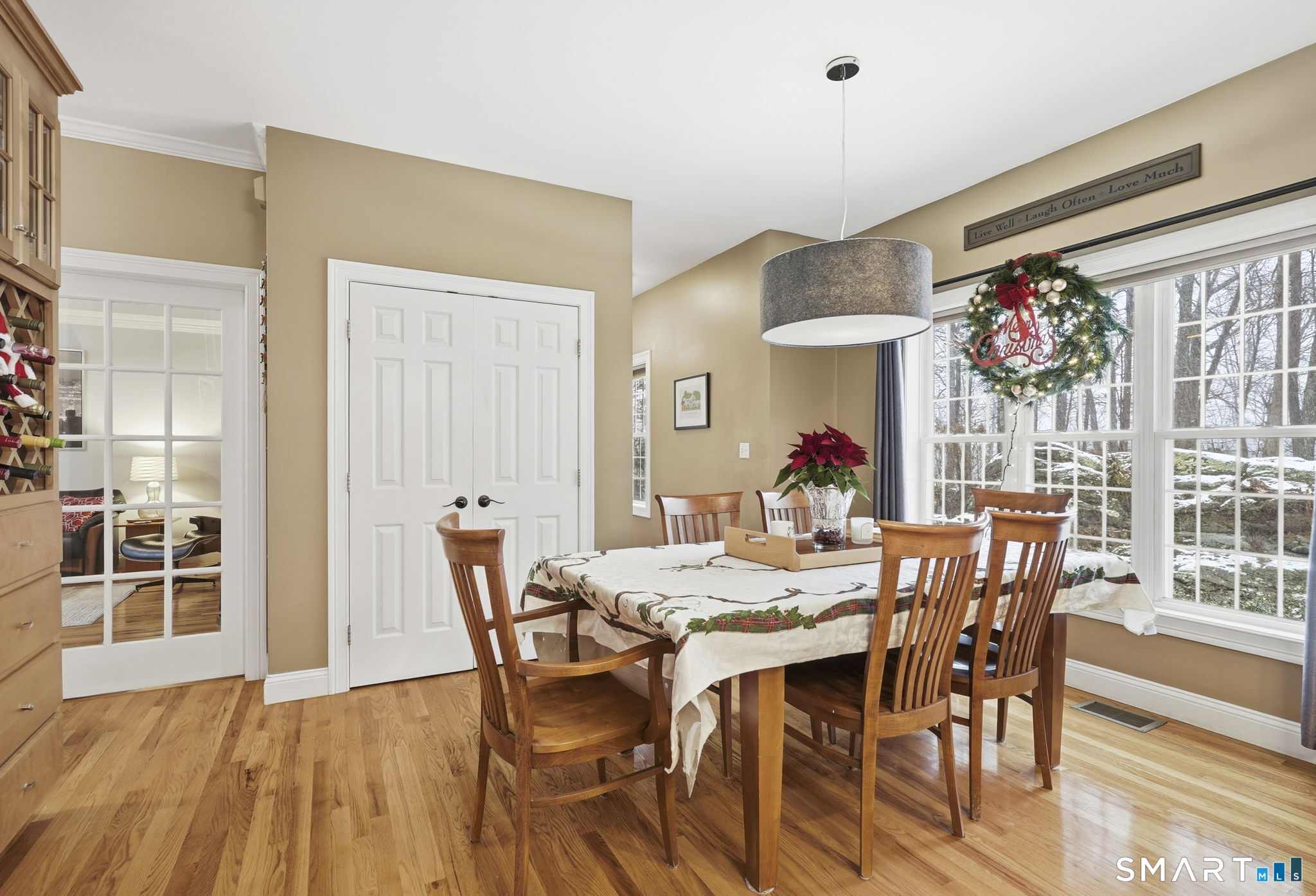 24 Scott Road Oxford, CT 06478 - Photo 9 of 39 a view of a dining room with furniture wooden floor and chandelier