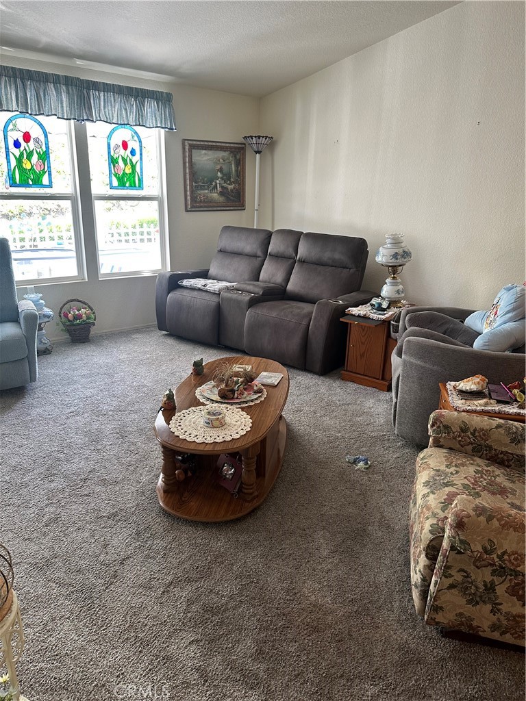 38641 Via Azul Murrieta, CA 92563 - Photo 4 of 18 a living room with furniture and window