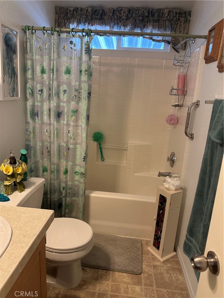 38641 Via Azul Murrieta, CA 92563 - Photo 8 of 18 a bathroom with a sink a toilet and shower