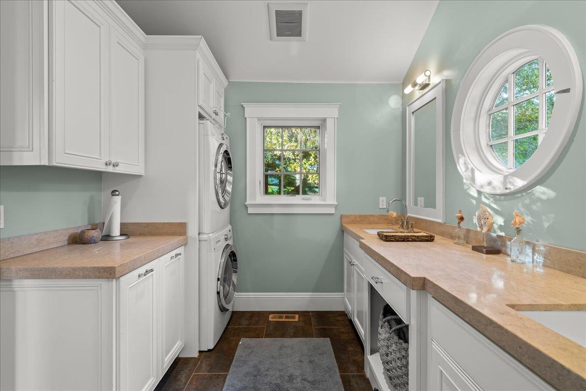 3510 Alpine Road Portola Valley, CA 94028 - Photo 50 of 77 a bathroom with a granite countertop sink and a mirror